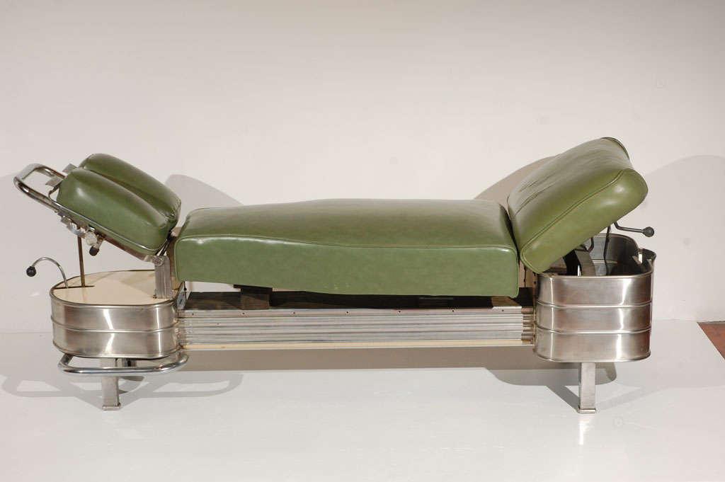 Great 1940s chiropractor bench; chrome and green vinyl with a Lucite handle.