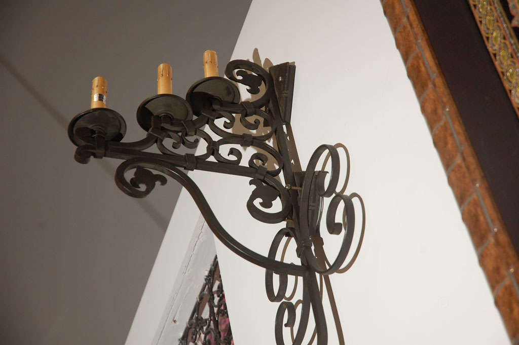 Spanish Colonial Set of Three Large Spanish Wrought Iron Wall Sconces with Three Lights