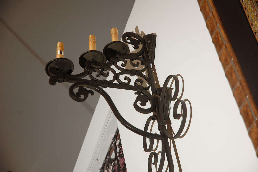 Set of Three Large Spanish Wrought Iron Wall Sconces with Three Lights In Excellent Condition In North Hollywood, CA