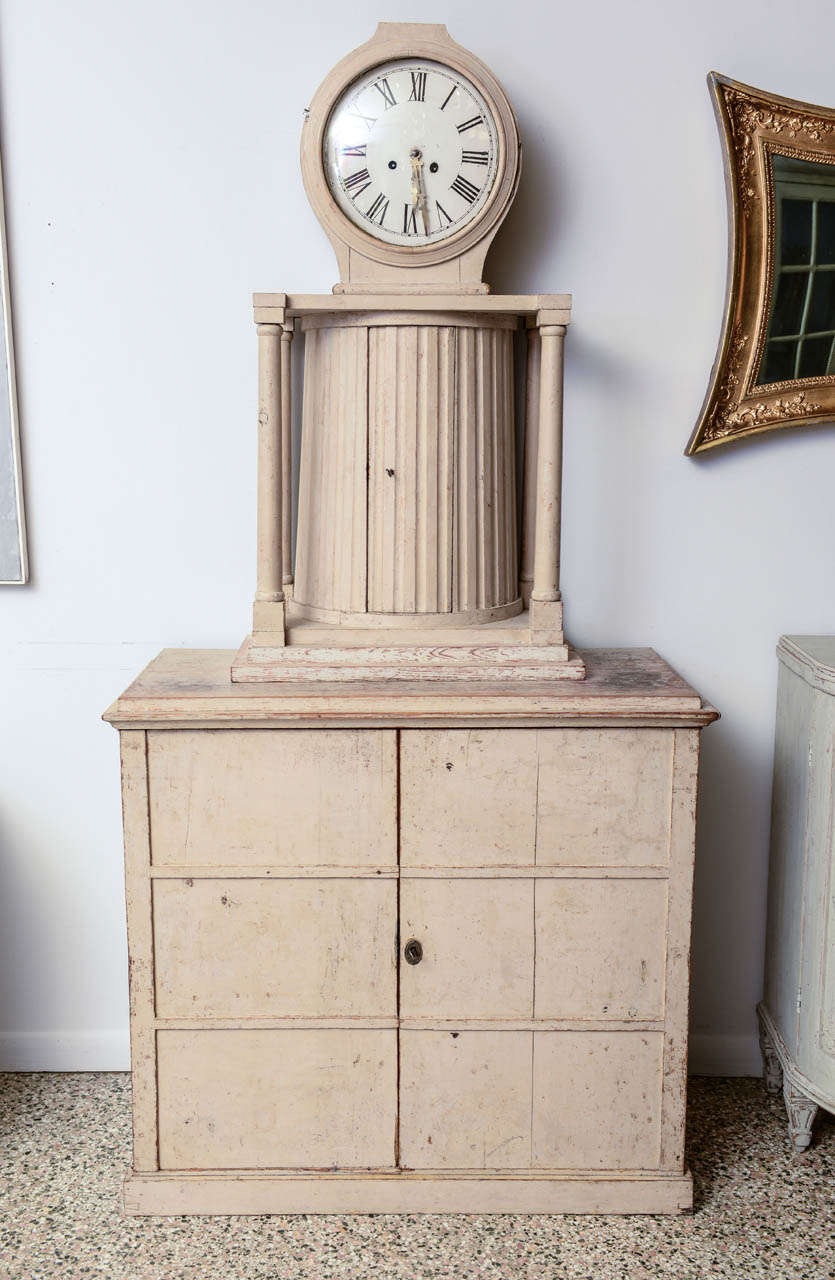 Period antique Swedish Gustavian clock cabinet late 18th century, dry scraped down to the original color. The clock head
has original glass and is in working condition.
Very unusual Swedish antique clock cabinet.