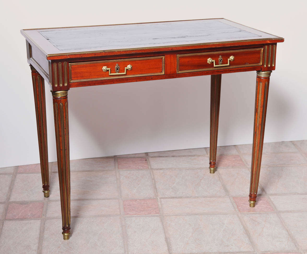 19th c Russian leather topped writing desk with hand hammered brass details