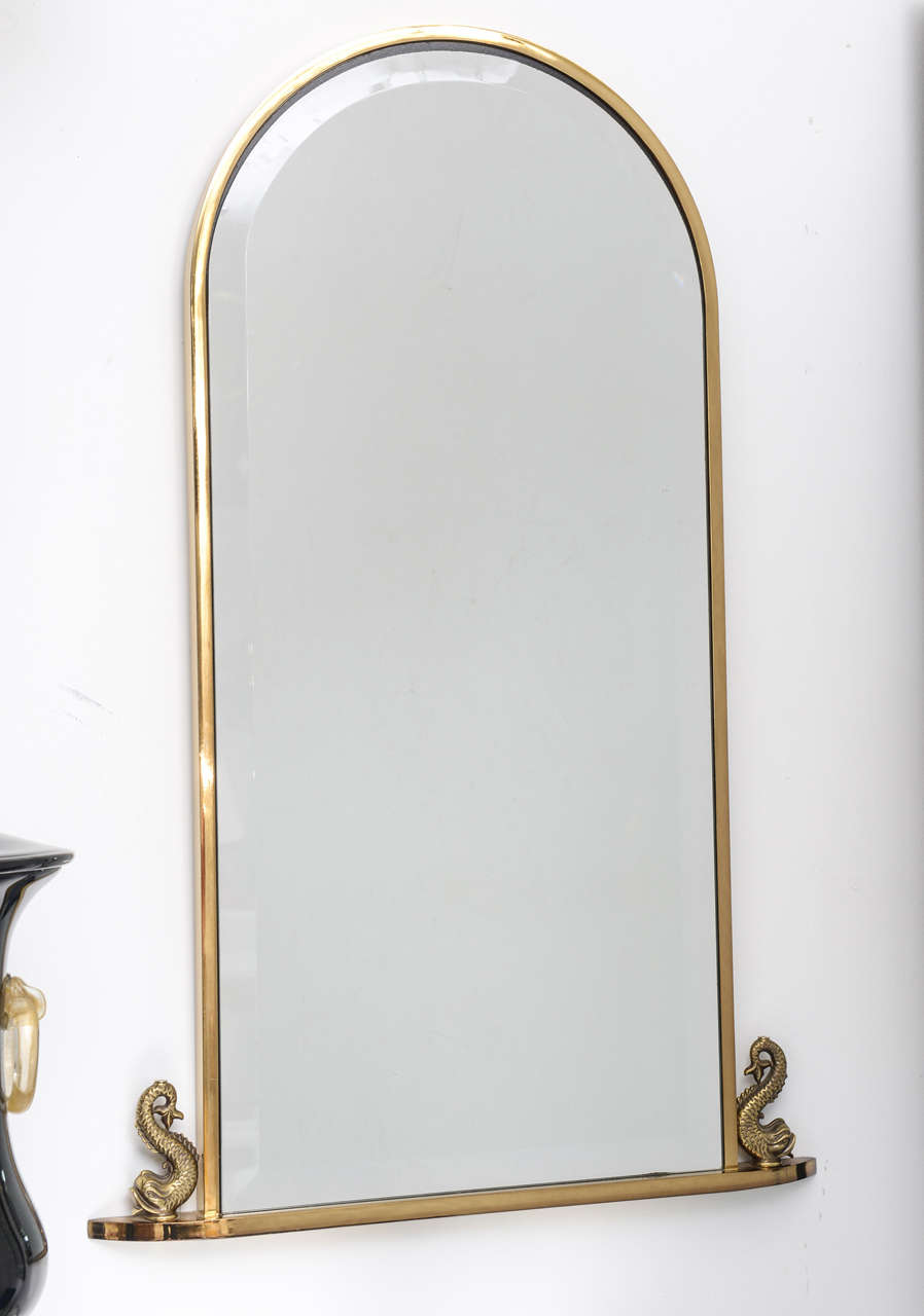 Vintage brass pier mirror with dolphin motif and original 