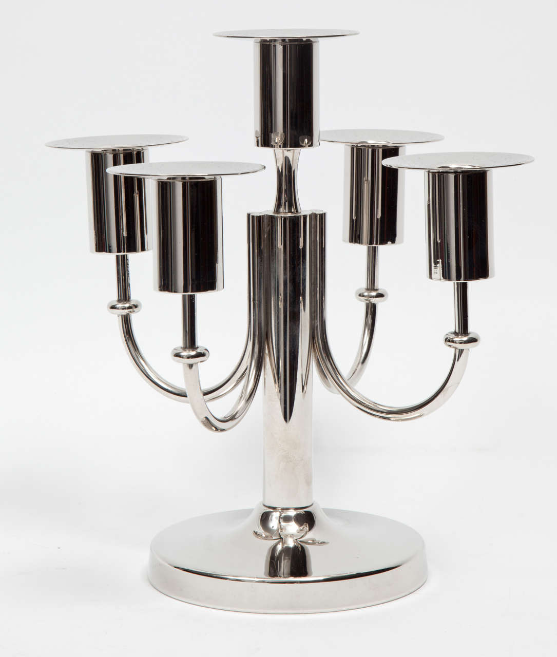 Mid-century pair of classically styled five-arm candelabras in polished nickel with removable bobeche detail. Stamped.