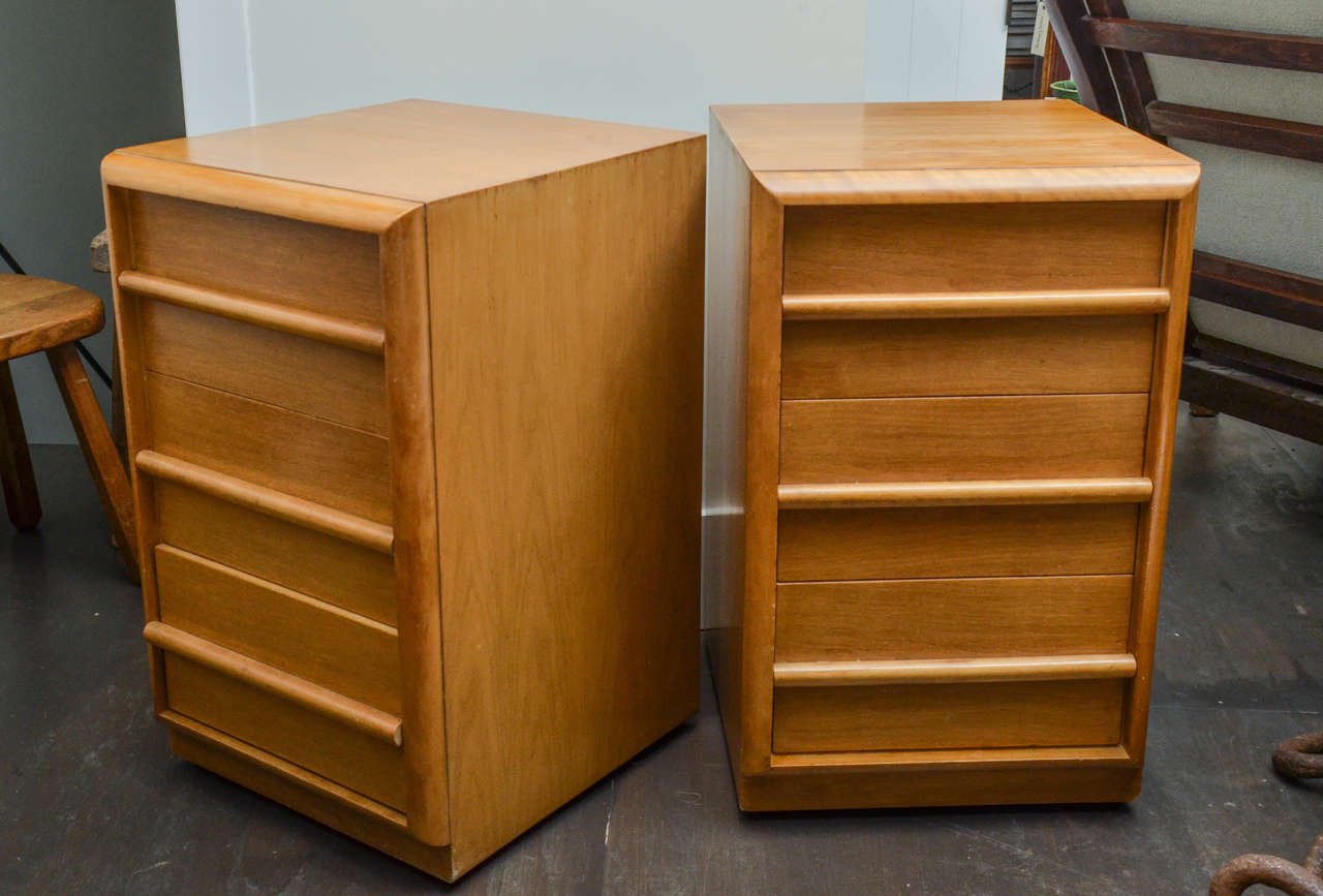 Pair of bedside or end tables by T.H. Robsjohn-Gibbings for Widdicomb, signed and labeled.
     