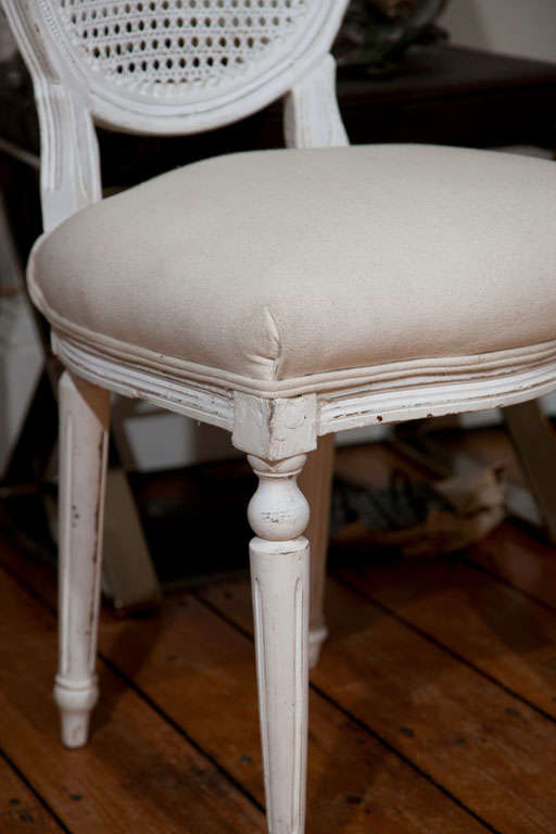 Six Louis XVI Style Painted Dining Chairs with Caned Backs (Louis XVI.)