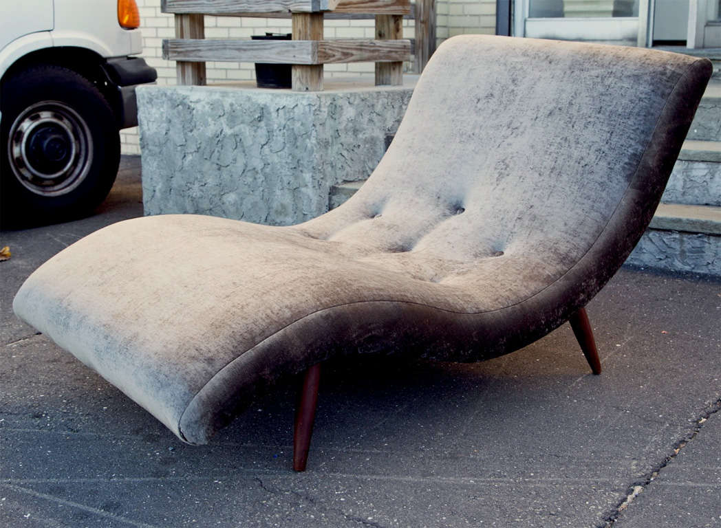 MID CENTURY BODY SHAPED CHAISE LOUNGE--REUPHOLSTERED  TAUPE VELVET. BUTTONED-  MAHOGANY  LEGS