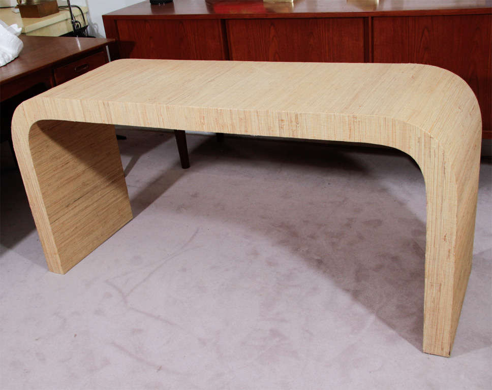 Natural Grasscloth covered console table. Simplex design, in the style of Karl Springer.

Reduced from: $4,750