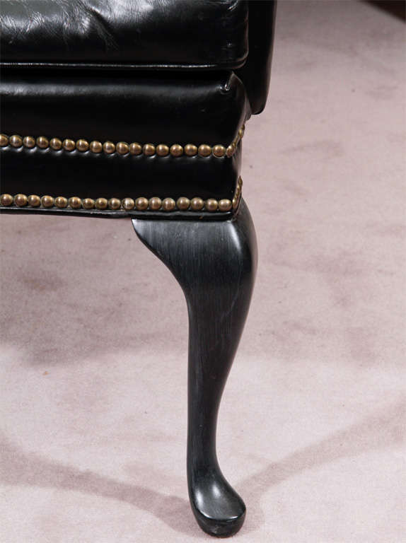 antique black leather chair