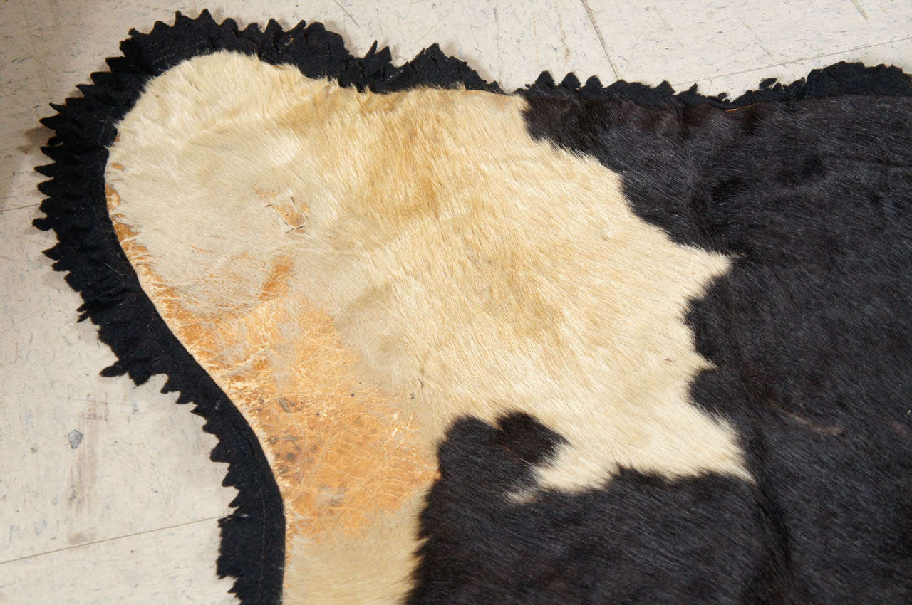 A Vintage Cow Hide Rig With Felt Back In Fair Condition For Sale In Hudson, NY