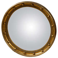 A Vintage Regency Style Convex Gilded Mirror