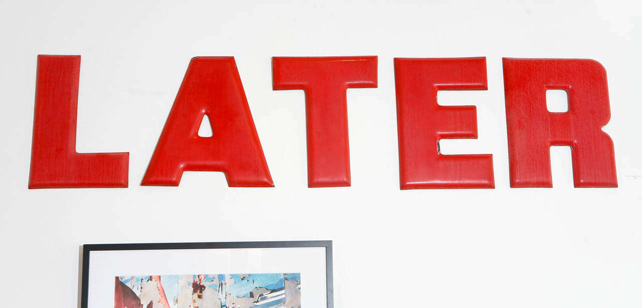 In a vivid, charming cherry red, these vintage Texaco Gas Station letters spell out the word 
