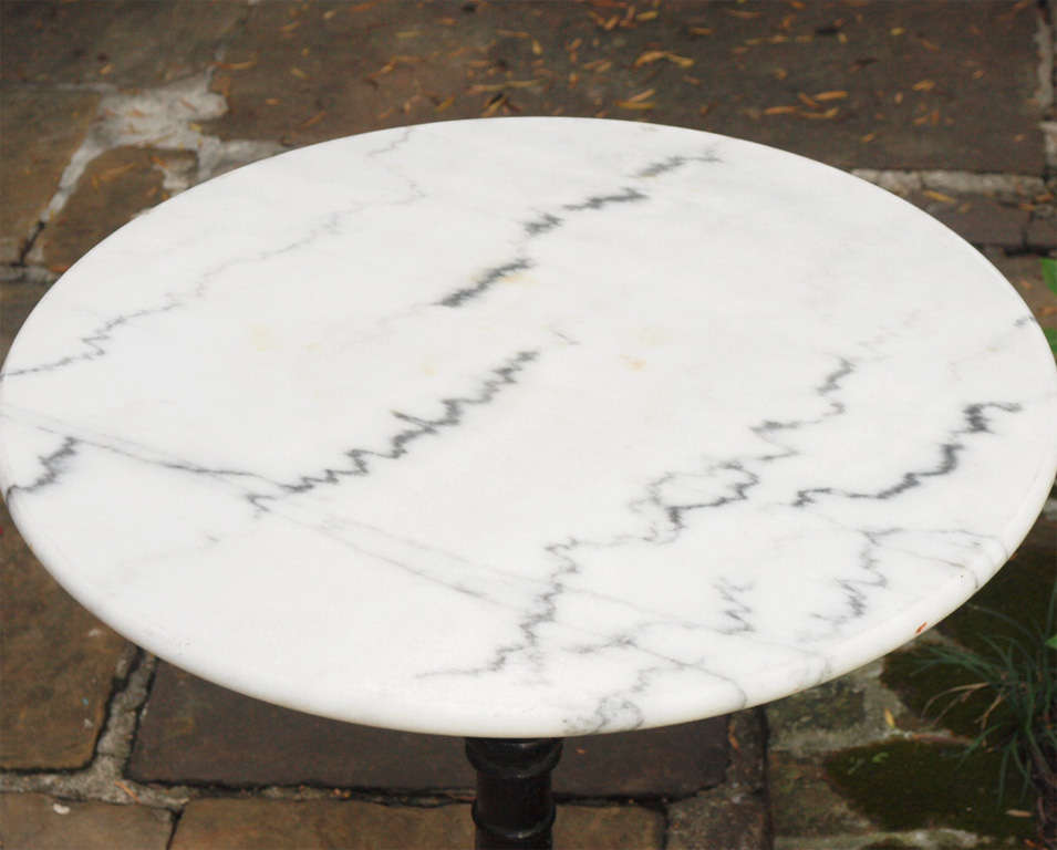 French Belle Epoque painted iron bistro table in the Grenoble style, with white marble top