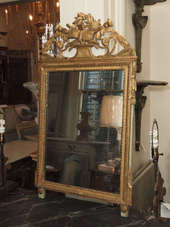 Period Louis XVI giltwood mirror.