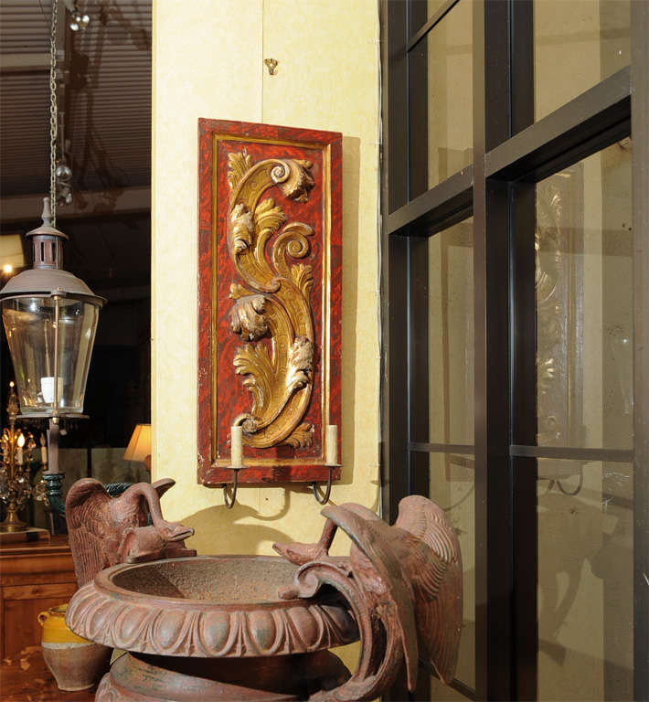 A large and impressive Rococo style 19th century painted and gilded two-arm wooden sconce.
 