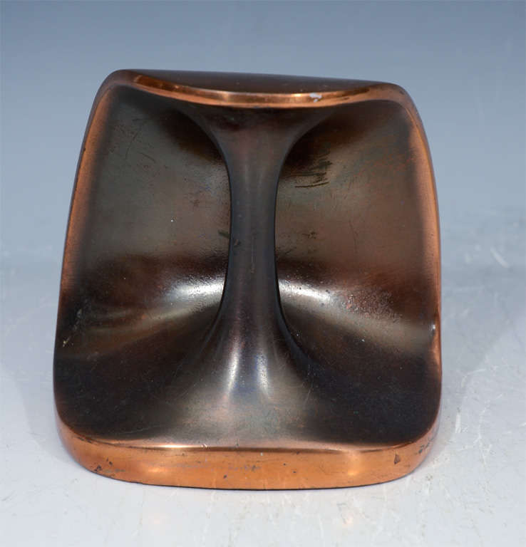 A pair of vintage sculptural bookends in copper by noted mid century designer Ben Seibel. The pieces have a darkened patina on the interior with a aged copper outer.