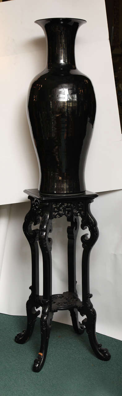 Pair of highly decorative black color Chinese style porcelain vases on matching black lacquered pedestals.
Stock number: PO1.