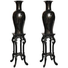 Pair of Decorative Black Chinese Style Porcelain Vases on Lacquered Pedestals