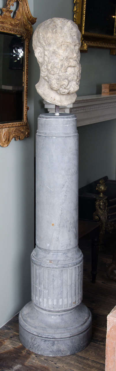 Mounted on an 1820 solid Bardiglio marble column.