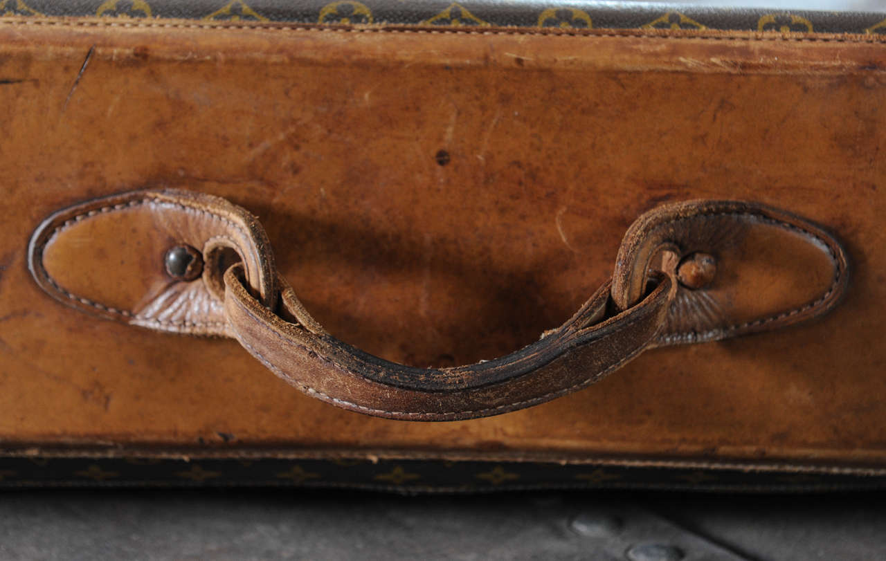 A vintage Louis Vuitton monogram leather suitcase / luggage 1