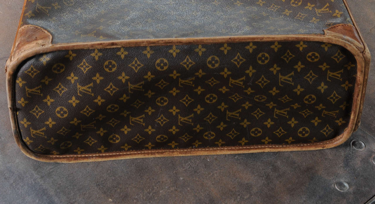 A vintage Louis Vuitton monogram leather suitcase / luggage 3