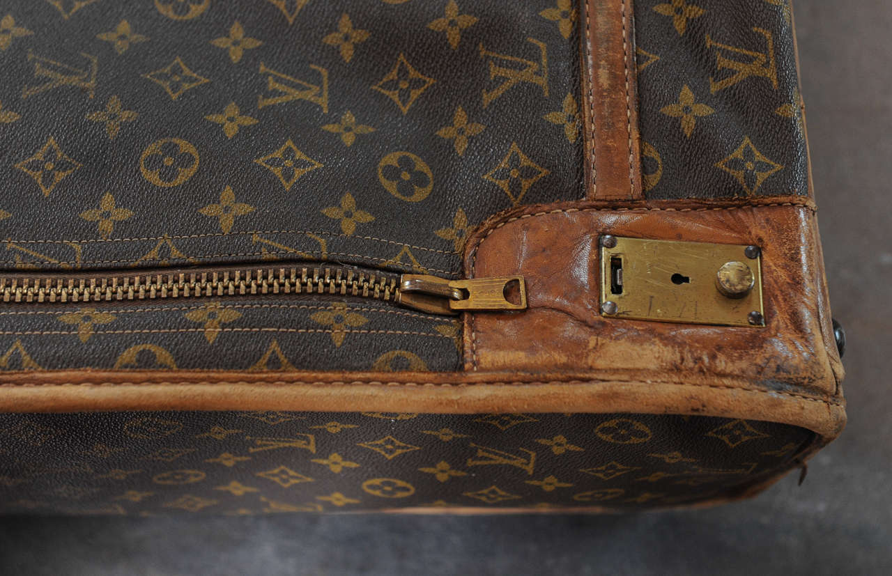 A vintage Louis Vuitton monogram leather suitcase / luggage 4
