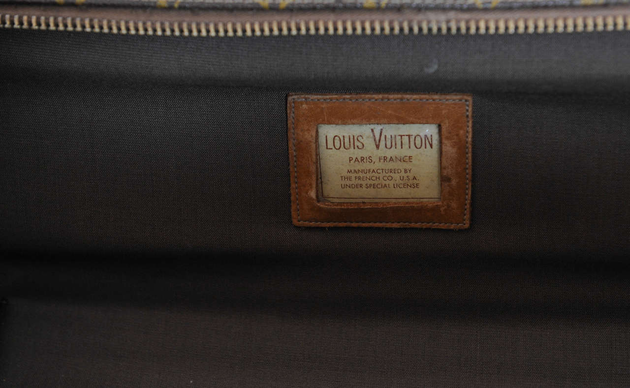 A vintage Louis Vuitton monogram leather suitcase / luggage 6