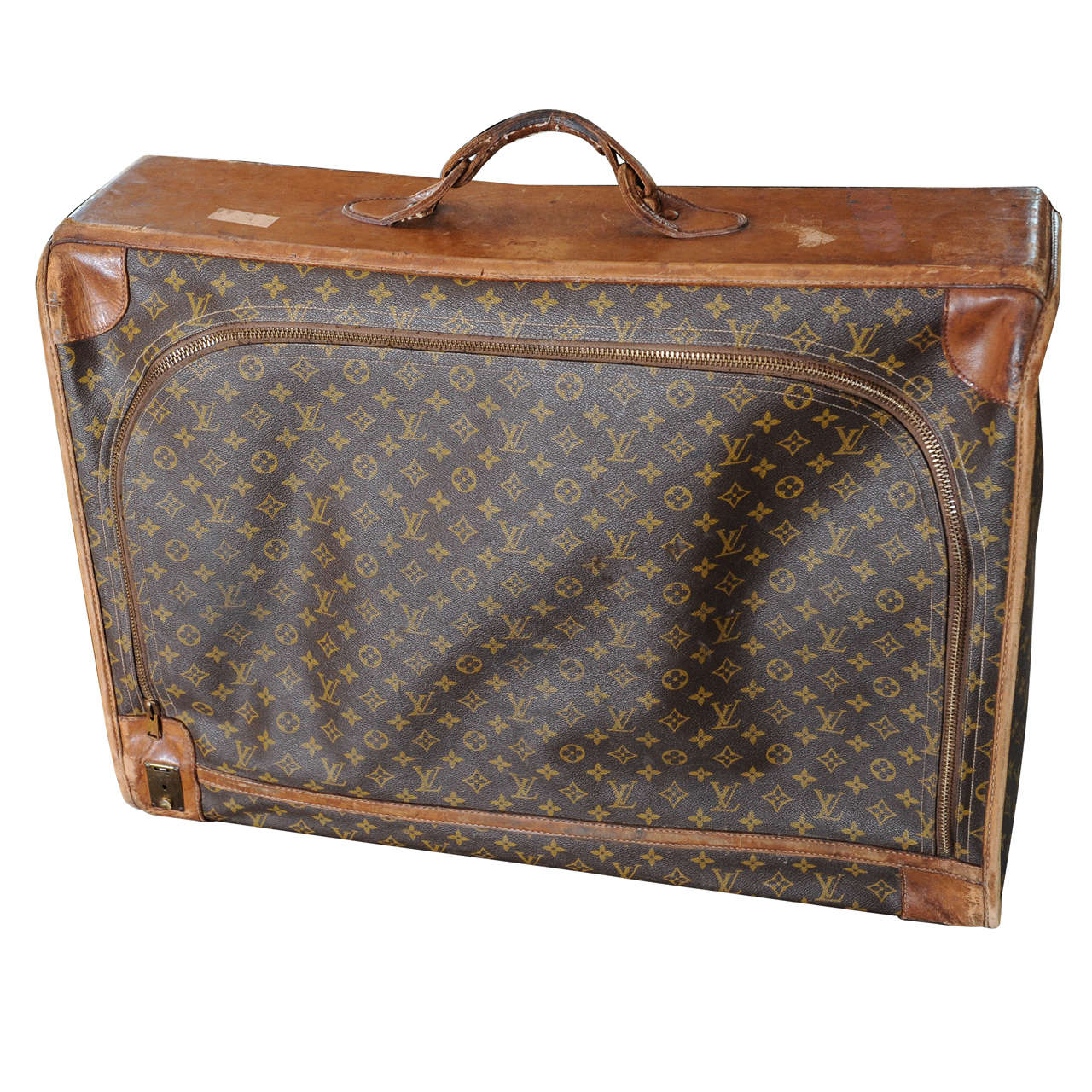 A vintage Louis Vuitton monogram leather suitcase / luggage