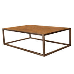 A coffee / centre table made of a 19th C. Versailles-pattern marquetry panel