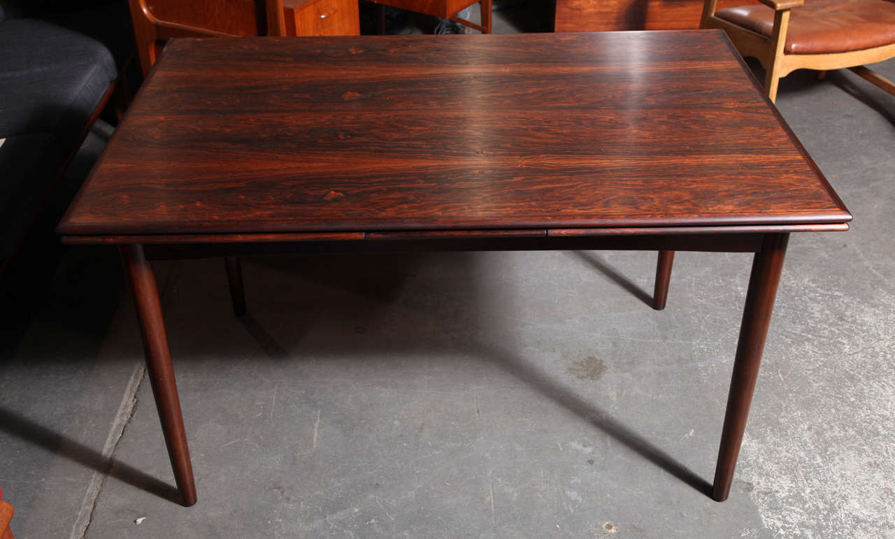 Vintage 1960s Danish Dining Table 

This Vintage Dining Table is in like-new condition and expands to seat 10 people. Simply lift the end of the top of the table and pull the leaf out; no need for leaves taking up room in your closet or having to