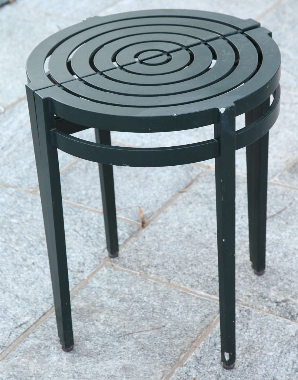Can be used together to form a circular side table or apart.  Two pairs available.  Handcrafted in dark green powder-coated aluminum by McKinnon and Harris of Virginia.