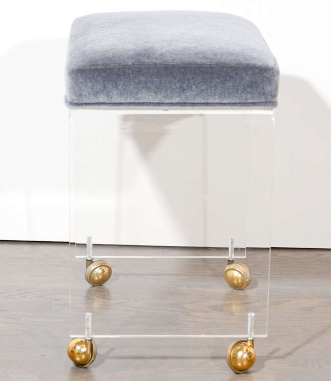 Lucite, Brass Wheels and Newly Upholstered in Silver Gray Mohair 