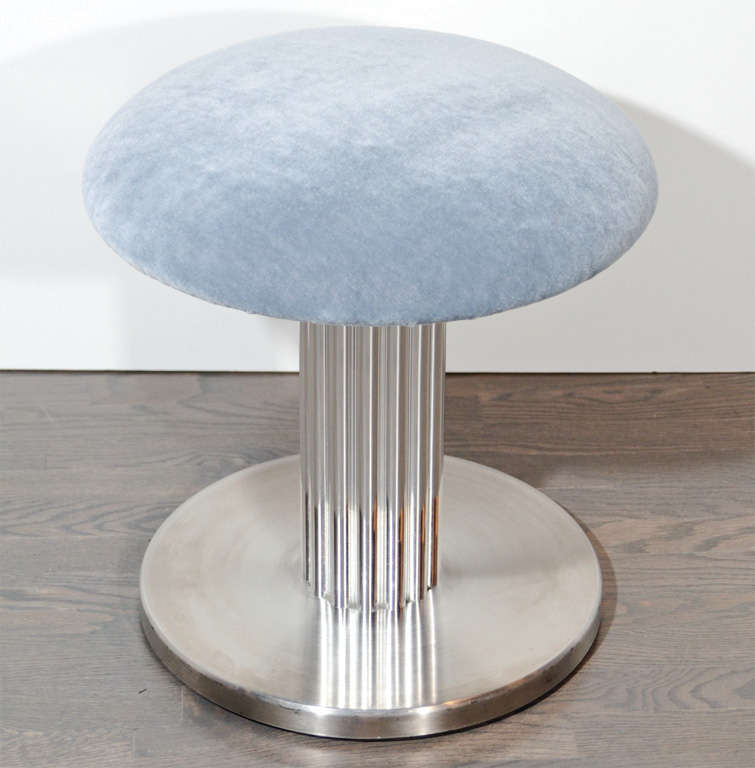 This modernist vanity stool features a fluted pedestal base in polished chrome and newly upholstered in pewter mohair.It swivels as well.