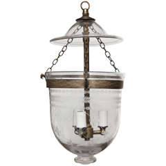 Antique glass bell jar with etchings