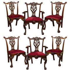 Eight Ornately Carved Mahogany Chippendale Style Chairs