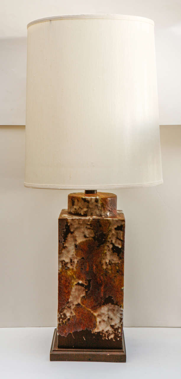Interesting studio pottery lamp with shade.