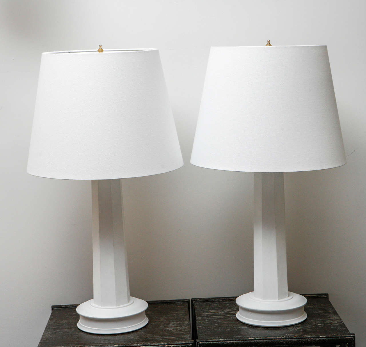 Striking pair of 1940s column table lamps in a gesso finish, with new custom linen shades. Recently rewired.
