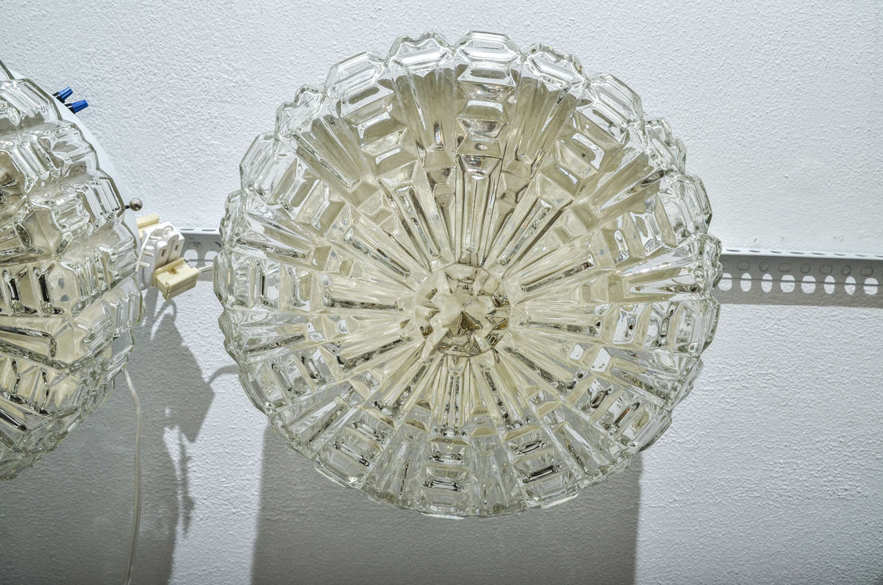 Large clear textured glass flush mount ceiling fixture.