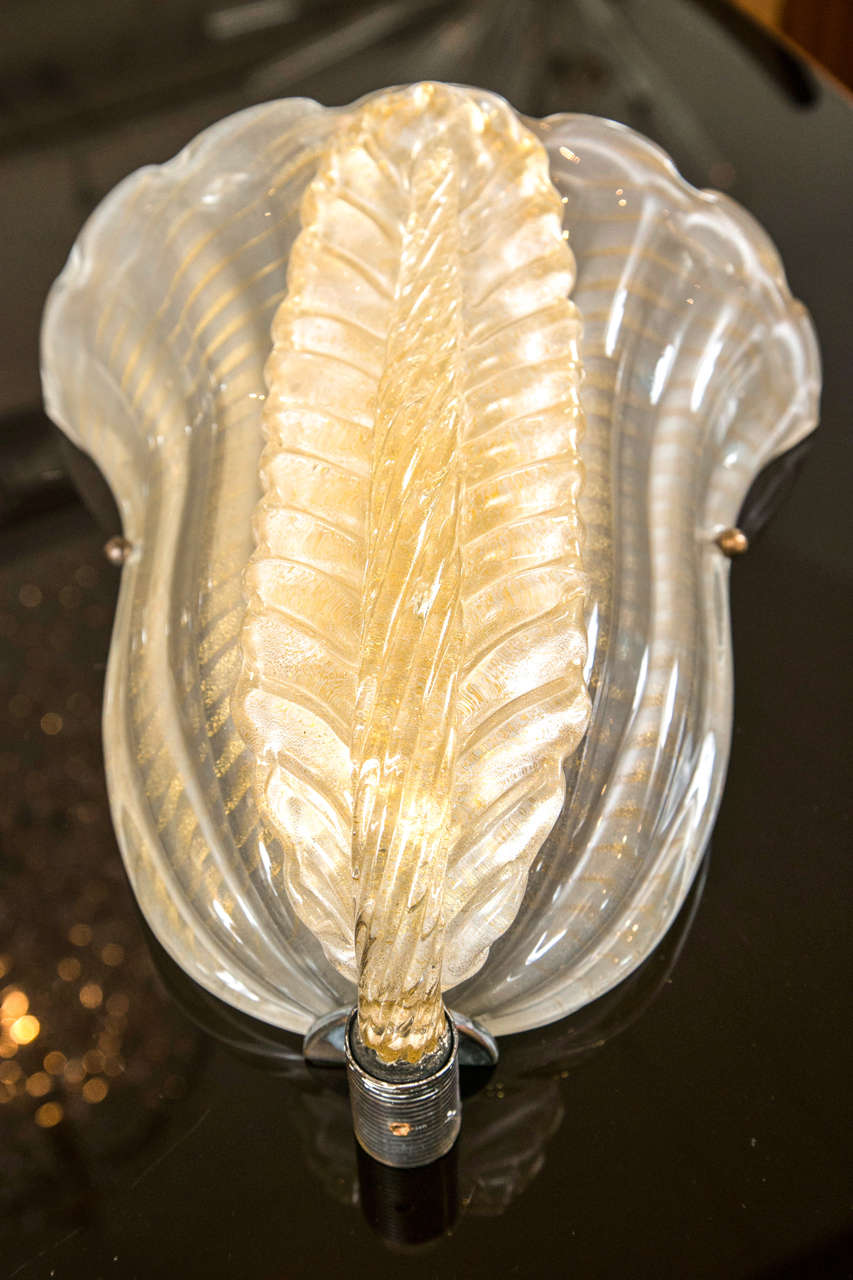 Finely blown gold  on off white Murano wall lights with twisted  center leaf, note angled gold striations to the  tulip shaped form termed 'cordonato' technique
attributed to Seguso, 1950's
wonderful large size