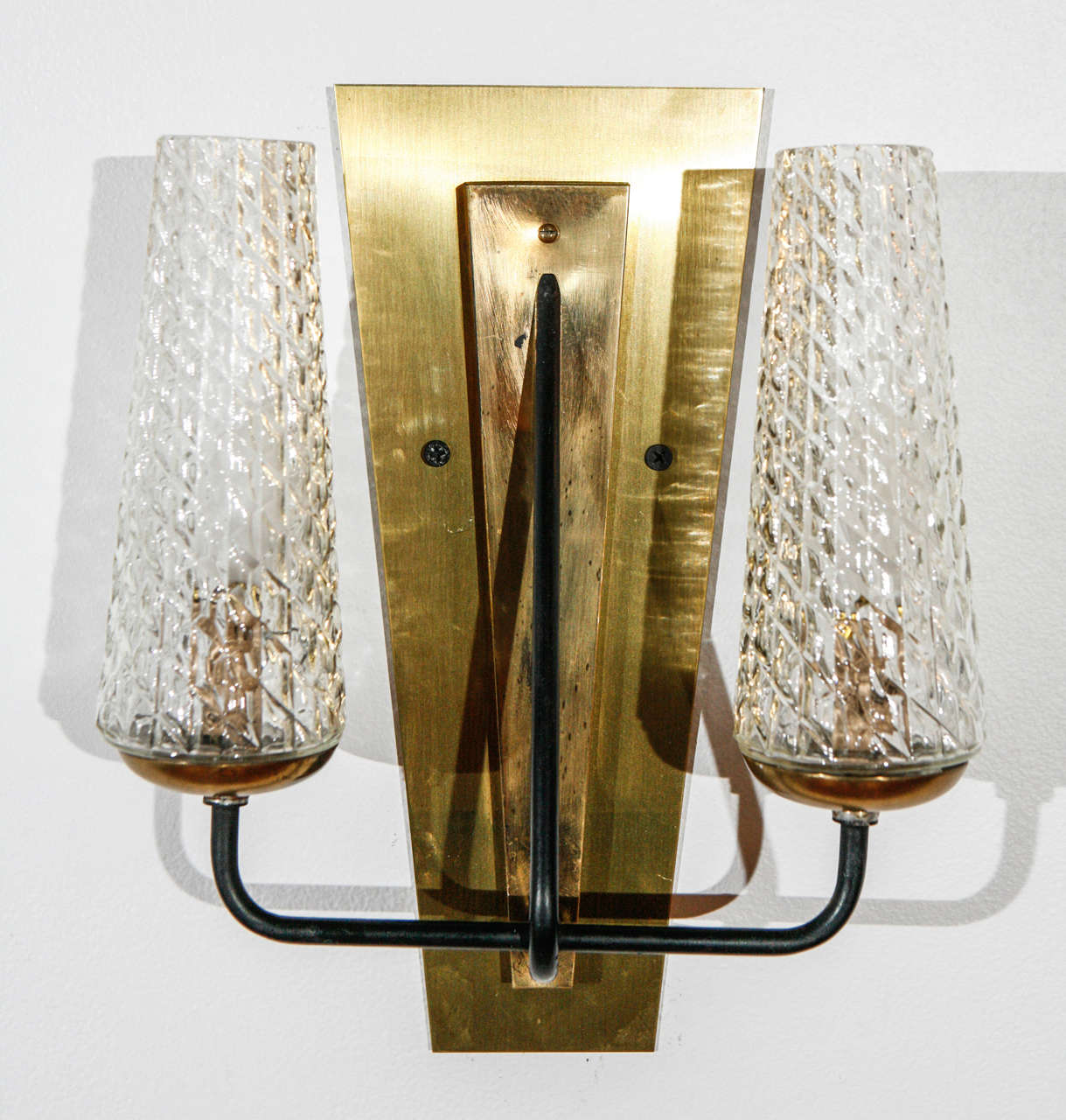 Pair of Italian Mid-Century doubles sconces, each sconce newly rewired for two 60 watt candelabra bulbs.