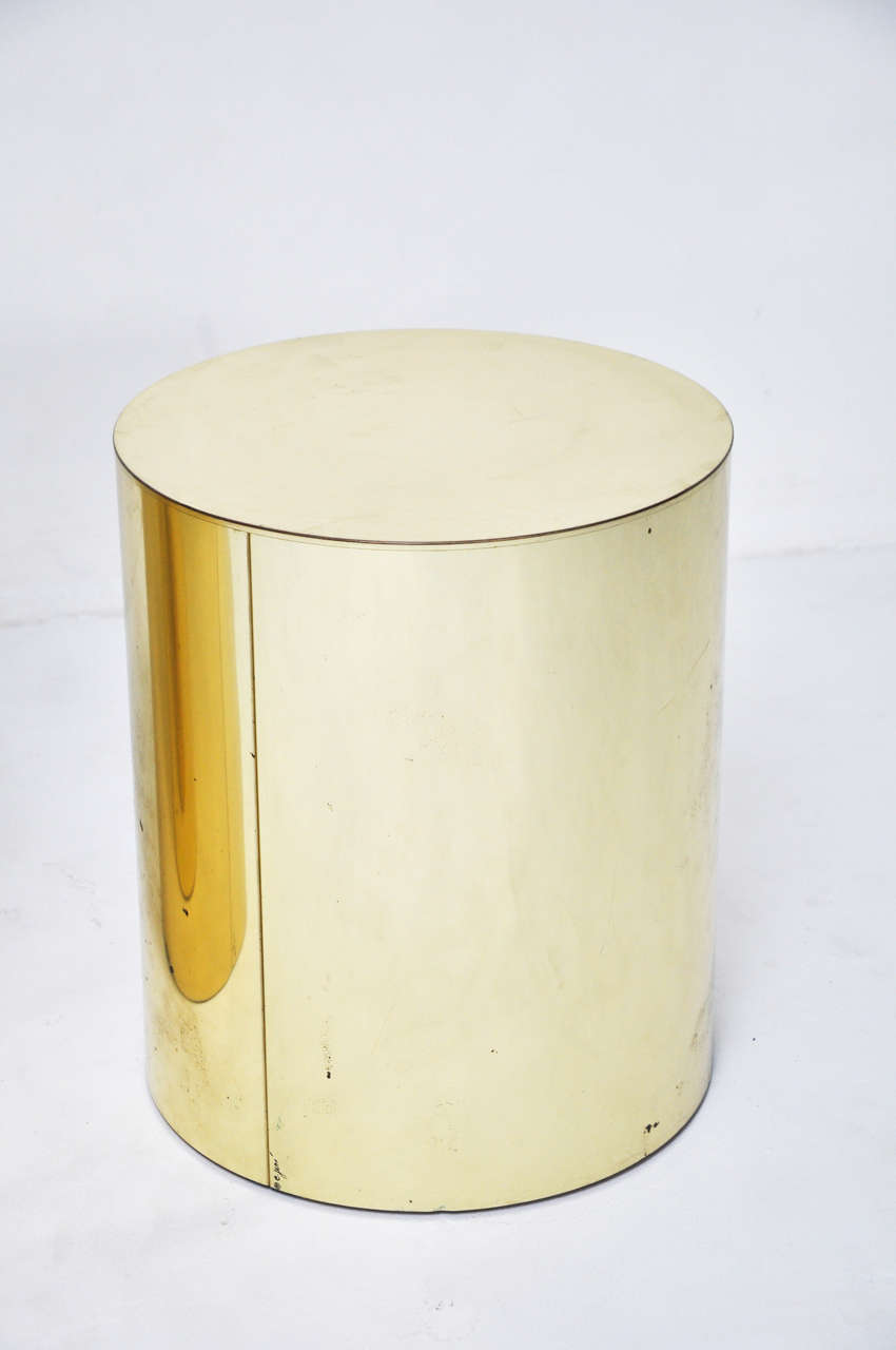 Brass drum end tables by Curtis Jere. Both tables are signed 