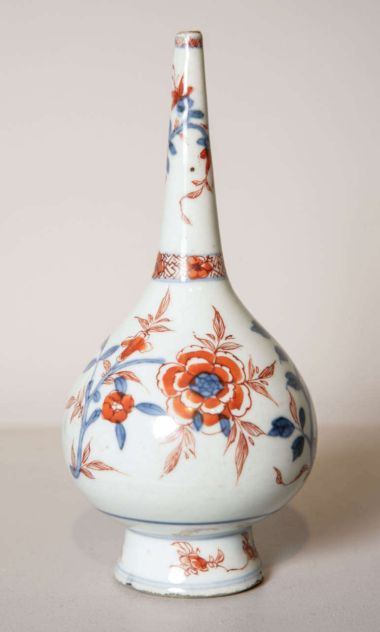 A pair of Imari rosewater sprinklers for the Islamic market painted in underglaze blue and iron red.