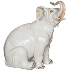 Antique Large Porcelain Figure of a Seated Young Elephant