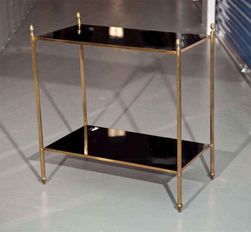 Rectangular form occasional table of brass with tapered legs and 