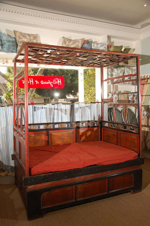 Charming carved and painted Chinese bed. Great as smaller bed or as sofa in a living room