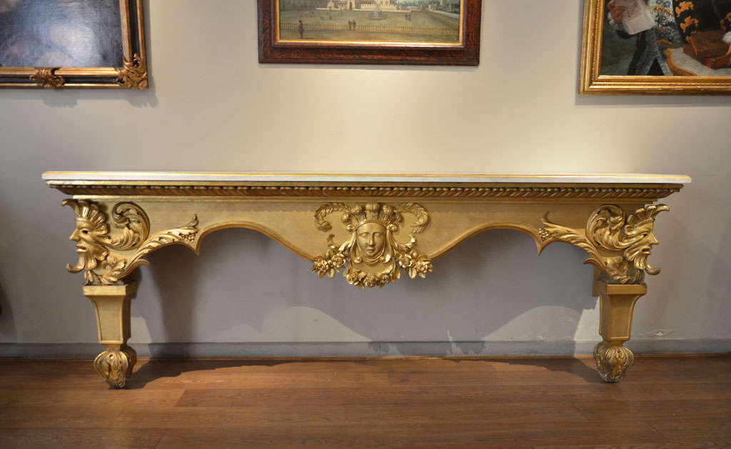 Carved and gilded wood, statuary marble, 260 x 55 x h 96 cm.

Provenance: Private collection, Lucca.