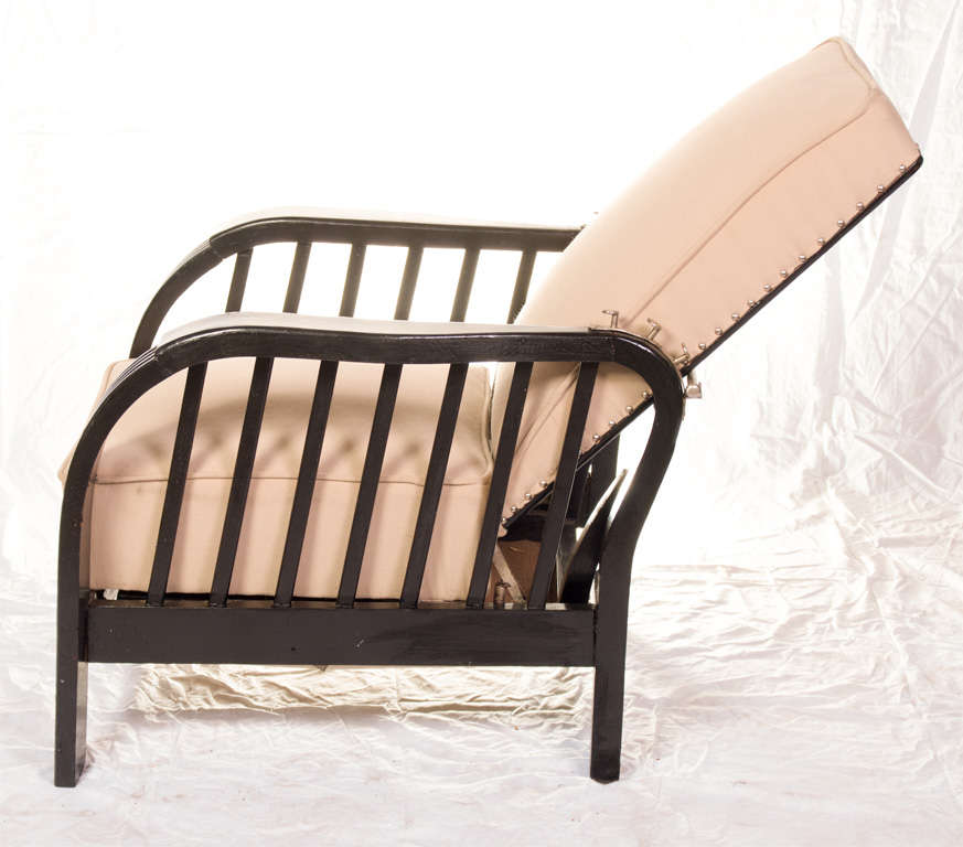 A Vintage Black Painted Reclining Fauteuil 