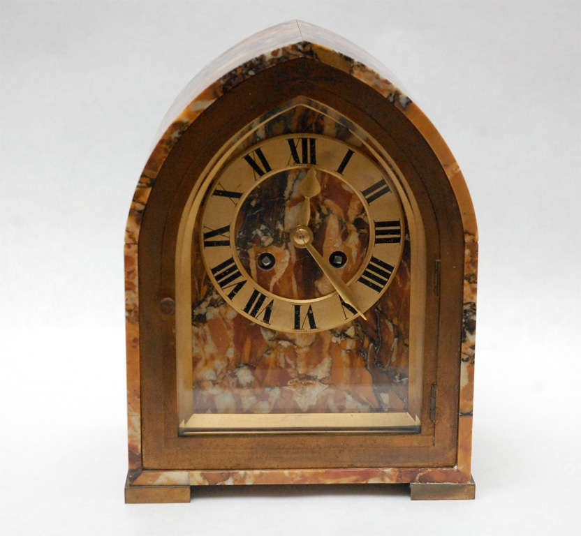 A handsome marble & brass desk clock by Tiffany & Co. The clock mechanism has been fully restored and is in excellent working condition.  Clock strikes on the hour and half hour.  Movement was made in France, face is hand painted.