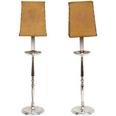 A Pair of French Silverplate Candlestick Lamps with Parchment Shades