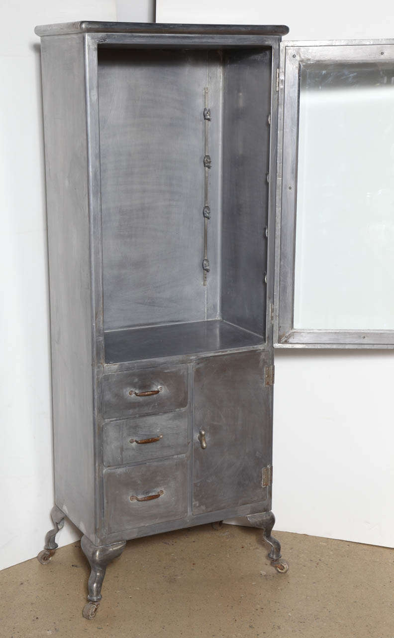 American circa 1900 rolling Medical Cabinet