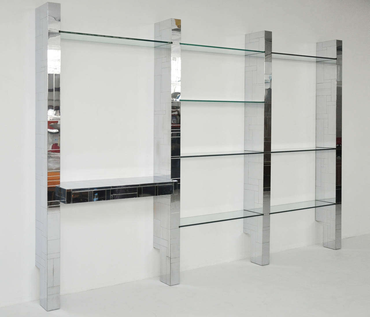 Paul Evans designed wall unit. All chrome from the cityscape line. Multiple glass shelves and a desk with drawer.